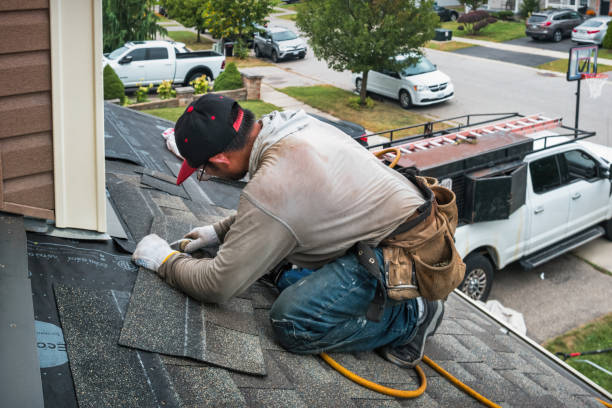 Professional Roofing technician working in Parish, NY